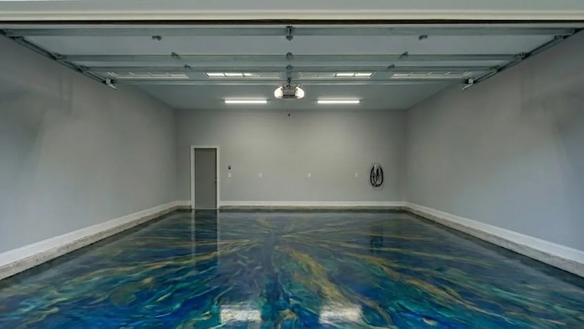 Smoke and silver metallic epoxy master bath floor